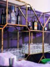 BAR-052 | GEO OCTAGON WINE SHELF GOLD FRAME CLEAR PLEXI